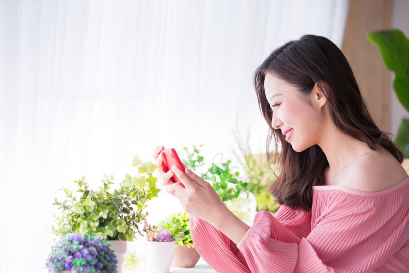 Woman Watch Video by Phone